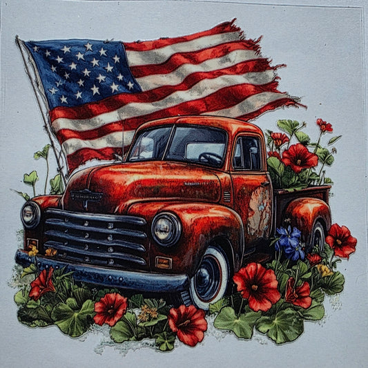 USA flag with red old style truck flowers